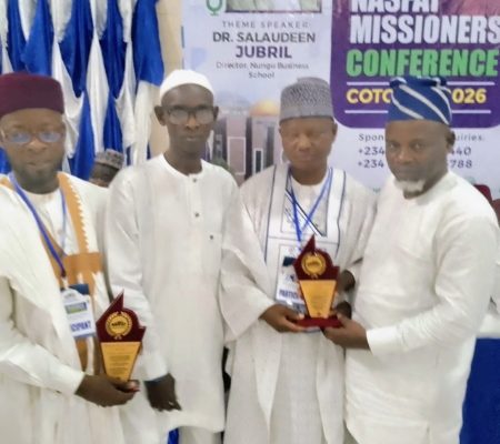 Lead Missioner NASFAT Kaduna Main Branch Receiving Award on behalf of the branch.